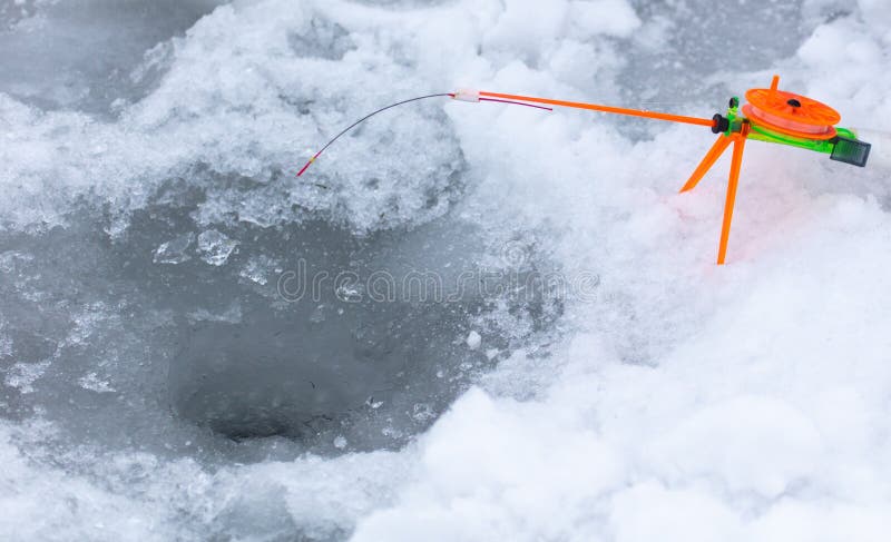 Ice fishing rod for winter fishing stock photography