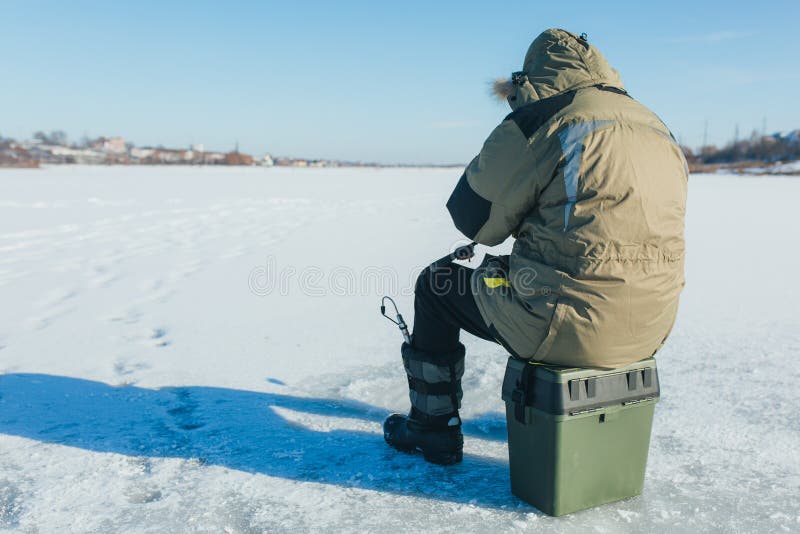 Ice fishing. Winter fishing royalty free stock photography