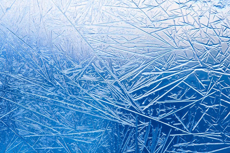 Ice flowers on the frozen window glass. pattern and textured lines stock photography Ice flowers on the frozen window glass. pattern and textured lines stock photography