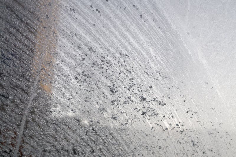 Ice frost on the car window during winter. Slovakia