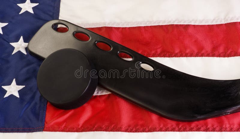 Ice hockey stick and puck stock images Ice hockey stick and puck stock images