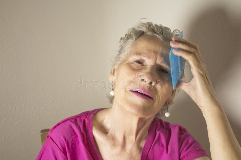 Senior Woman Ice Head Headache Stock Photos Free & RoyaltyFree Stock