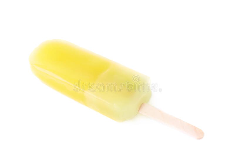 Frozen fruit juice ice pop yellow and green popsicle snack on a wooden stick isolated over the white background. Frozen fruit juice ice pop yellow and green popsicle snack on a wooden stick isolated over the white background