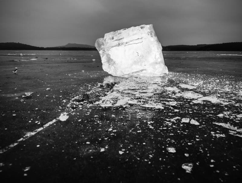 Ice Floe and Crushed Ice on Dark Frozen and Flat Ground. Shining ...