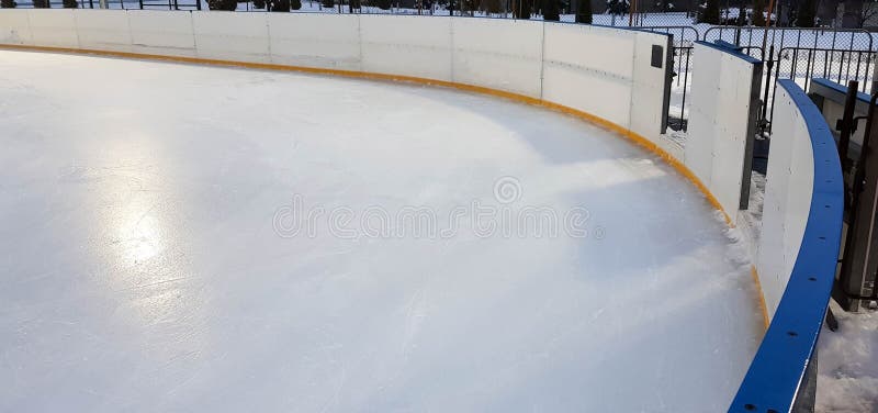 Ice rink floor surface background and texture in winter time