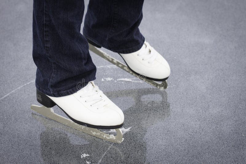 Ice Skates on ice stock photo. Image of outdoor, skating 29036064