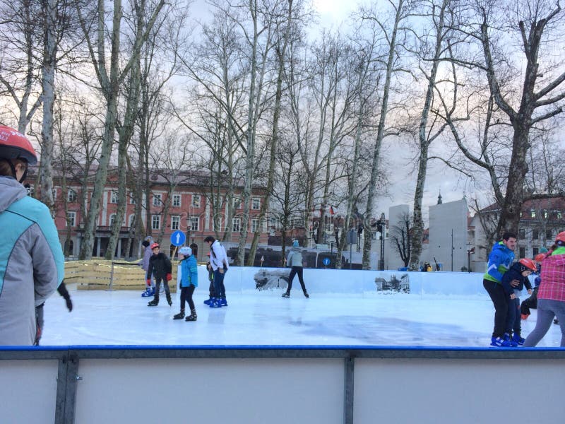Ice skating in main square stock photos