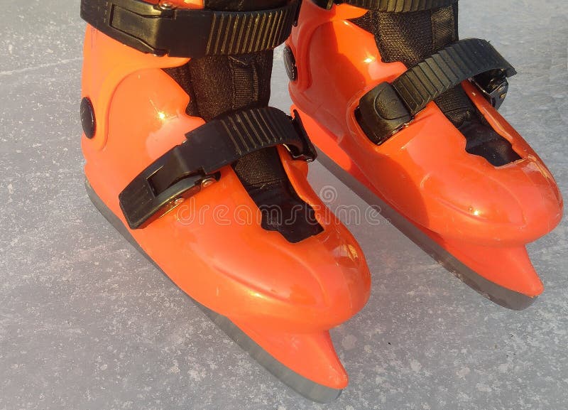 Ice skating on an ice rink stock image. Image of skates 302037601