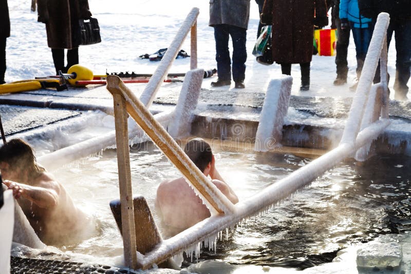 Ice swimming in Epiphany Day stock photo
