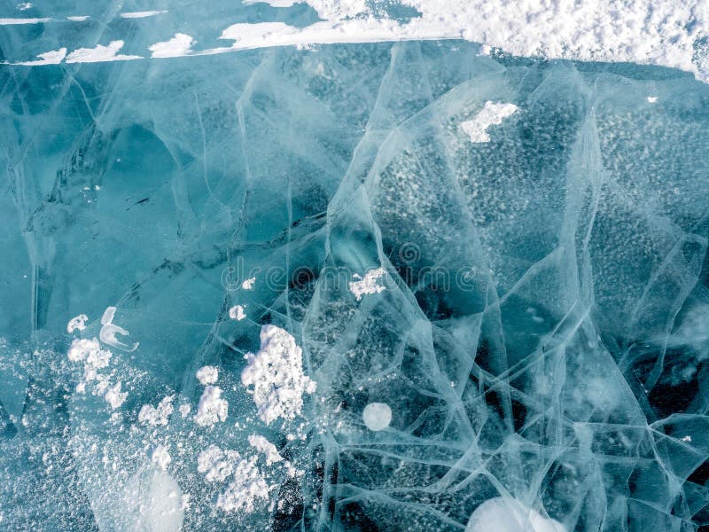 Ice texture with snow and cracks stock photos Ice texture with snow and cracks stock photos