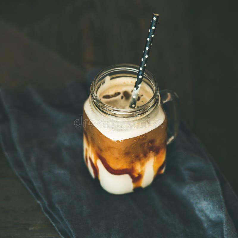 Iced Caramel Macciato Coffee with Milk in Jar, Square Crop Stock Image ...