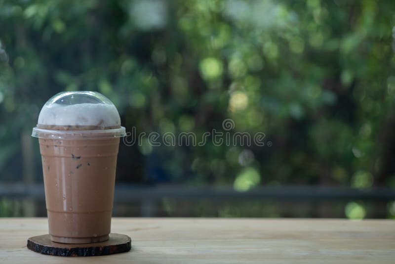 Iced Coffee In Takeaway Cup Stock Photo, Picture and Royalty Free Image.  Image 57801460.