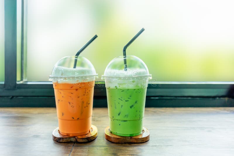 Iced Green Tea and Thai Iced Tea on Wood Table. Stock Photo Image of
