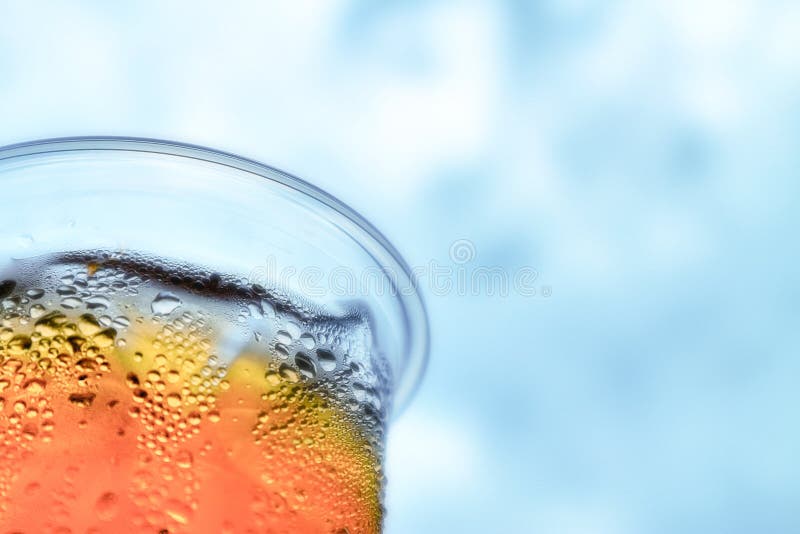 iced tea and cloudy blue sky