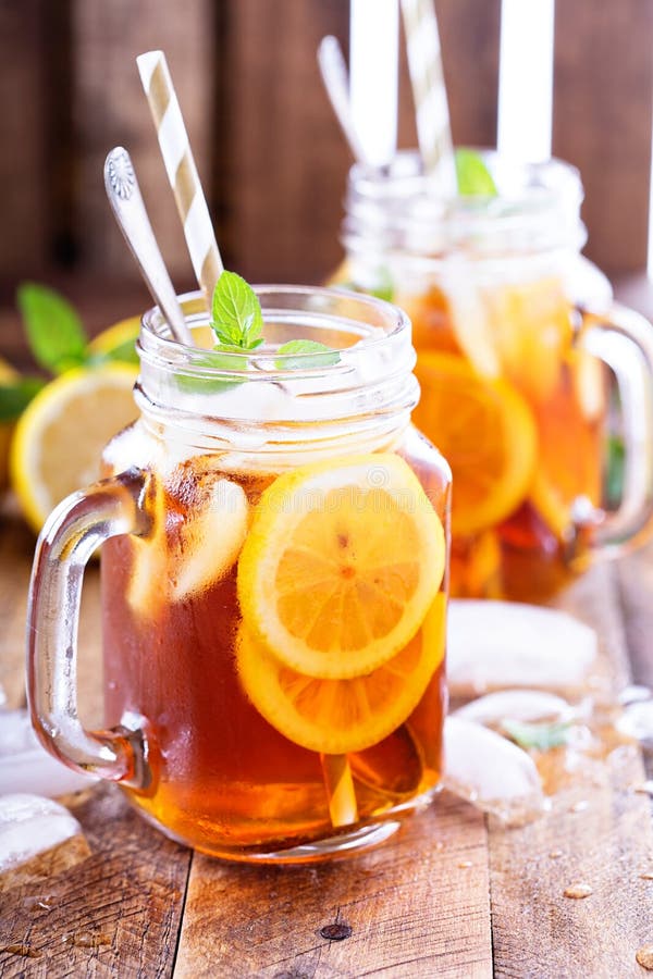 Iced tea with lemon slices stock image. Image of colorful 71483337