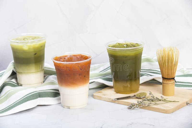 https://thumbs.dreamstime.com/b/iced-tea-variety-drinks-thai-milk-matcha-latte-yuzu-green-served-plastic-glass-put-cutting-board-cloth-decor-clear-196982915.jpg