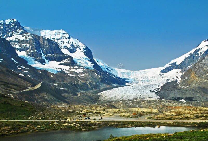 A view of the Columbia Icefield. The icefield is a glacier that is safe for tourist to walk on. A view of the Columbia Icefield. The icefield is a glacier that is safe for tourist to walk on.