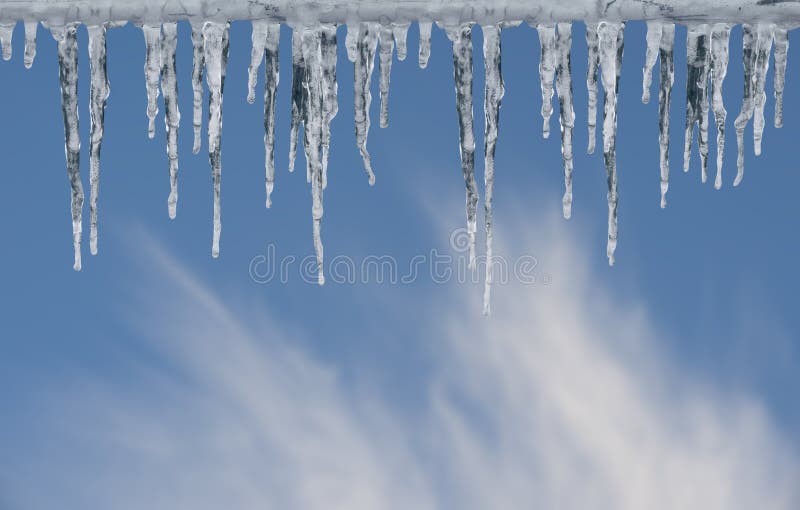 Icicles on blue sky