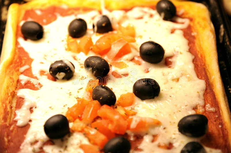 Iconic Italian food: pizza with black olives royalty free stock image Iconic Italian food: pizza with black olives royalty free stock image
