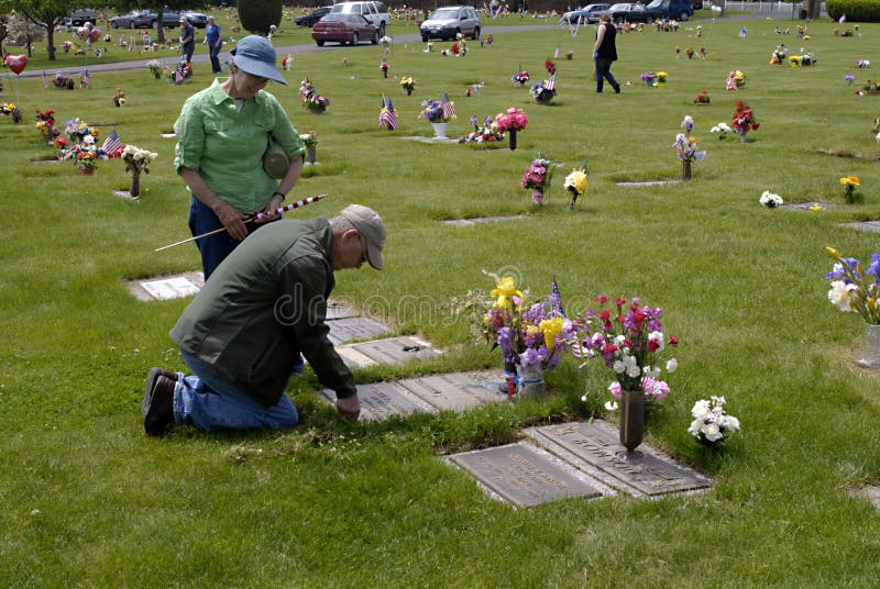 LEWISTON/IDAHO STATE /USA _ Thousands of americasn are putting flowers and flag at veterans,friends and families member grave on actual memorial day may 30, 2011, females and males, old and young at Lewiston-Clark memorial Garden 30 May 2011 (PHOTO BY FRANCIS JOSEPH DEAN/DEAN PICTURES). LEWISTON/IDAHO STATE /USA _ Thousands of americasn are putting flowers and flag at veterans,friends and families member grave on actual memorial day may 30, 2011, females and males, old and young at Lewiston-Clark memorial Garden 30 May 2011 (PHOTO BY FRANCIS JOSEPH DEAN/DEAN PICTURES)