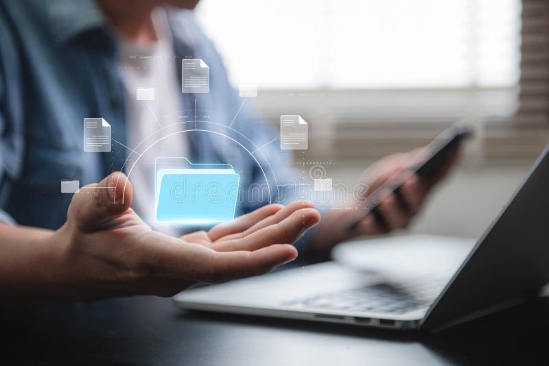 The idea of a document management system include a businessman holding a folder, document icon software, online file management stock image
