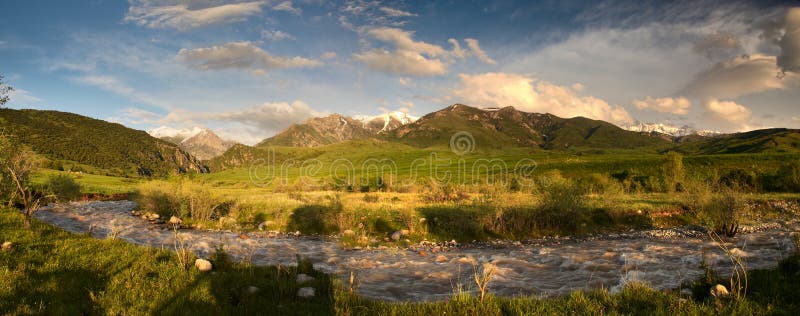 Sunset view of Tien Shan mountain range as viewed from Southern Kazakhstan. Sunset view of Tien Shan mountain range as viewed from Southern Kazakhstan