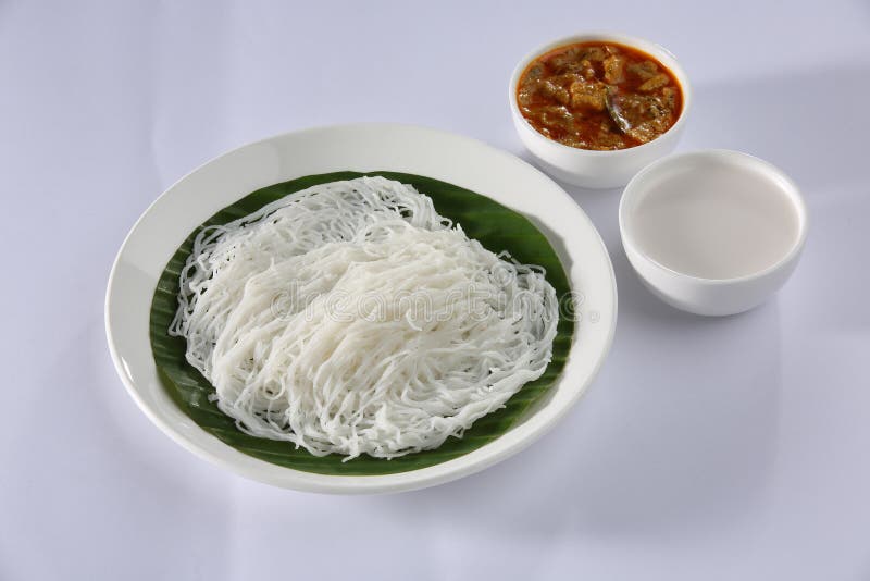 https://thumbs.dreamstime.com/b/idiyappam-coconut-milk-also-known-as-string-hoppers-made-rice-flour-serve-kerala-style-vegetable-stew-delicious-101029351.jpg