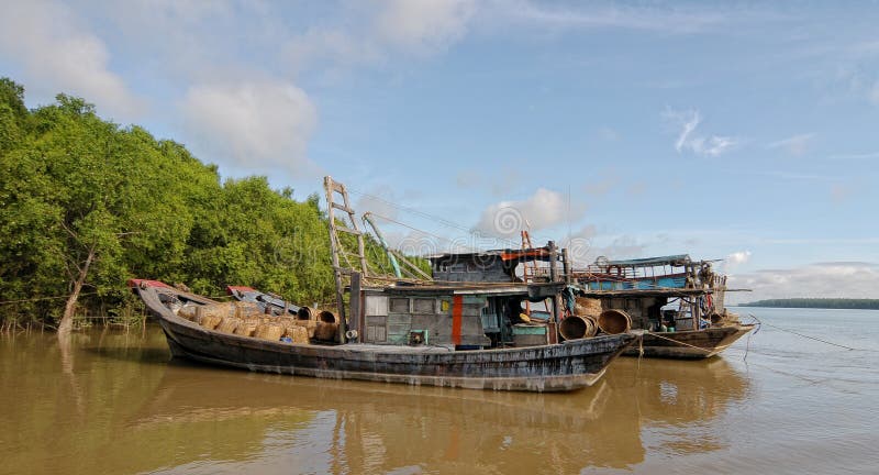 Idle boats waiting on Mekong river royalty free stock image Idle boats waiting on Mekong river royalty free stock image