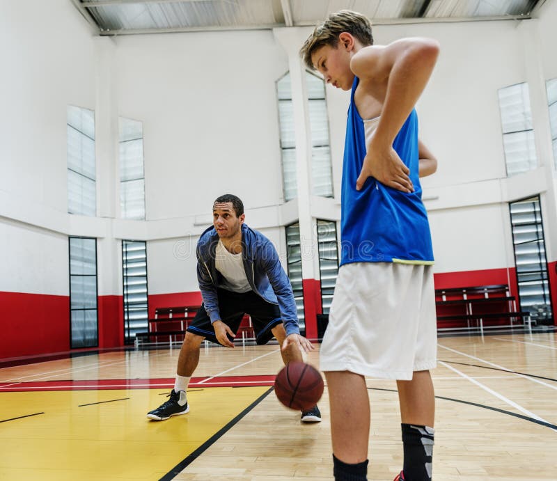 Idrottsman nen Exercise Game Concept för coachningbasketsport arkivbilder