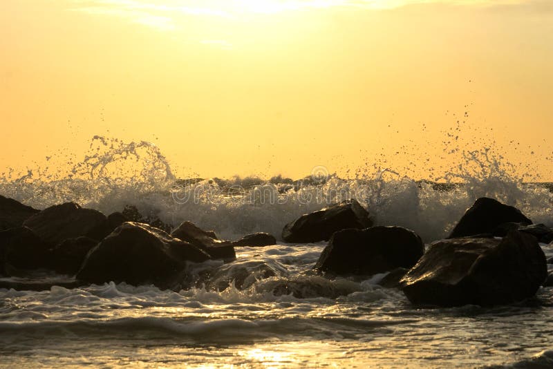 Idyllic sunrise on the sea beach royalty free stock photography