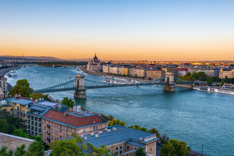 Iew of the Szechenyi Chain Bridge over Danube and the Hungarian Parliament Building in Budapest, Hungary stock image Iew of the Szechenyi Chain Bridge over Danube and the Hungarian Parliament Building in Budapest, Hungary stock image