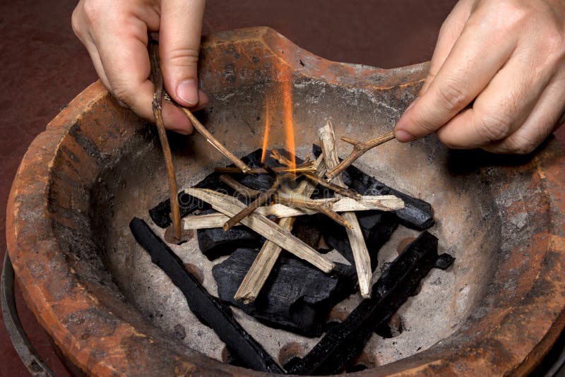 Ignite on stove with hand stock image. Image of ignite 131808347