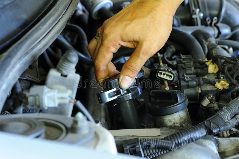Ignition coil stock image. Image of hand, spare, repair 54943257