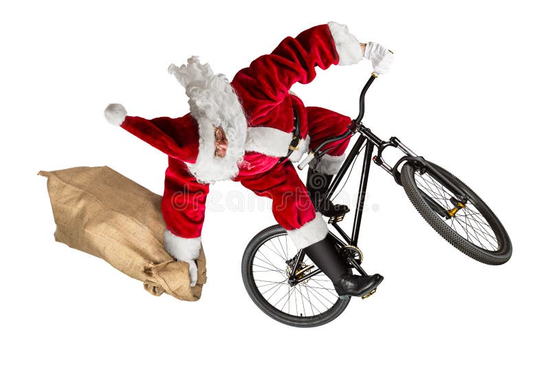 Il Babbo Natale pazzo salta sul mountain bike della sporcizia con le sedere della tela da imballaggio della iuta immagine stock Il Babbo Natale pazzo salta sul mountain bike della sporcizia con le sedere della tela da imballaggio della iuta immagine stock
