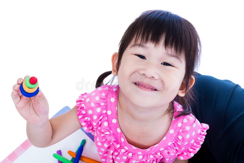 Il bambino gli mostra gli impianti da argilla, sopra bianco fotografia stock libera da diritti Il bambino gli mostra gli impianti da argilla, sopra bianco fotografia stock libera da diritti