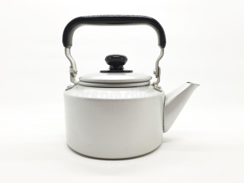 Il bollitore di tè è un tipo di vaso specializzato per acqua bollente con un coperchio, becco e maniglia, o un piccolo elettrodom fotografia stock libera da diritti Il bollitore di tè è un tipo di vaso specializzato per acqua bollente con un coperchio, becco e maniglia, o un piccolo elettrodom fotografia stock libera da diritti