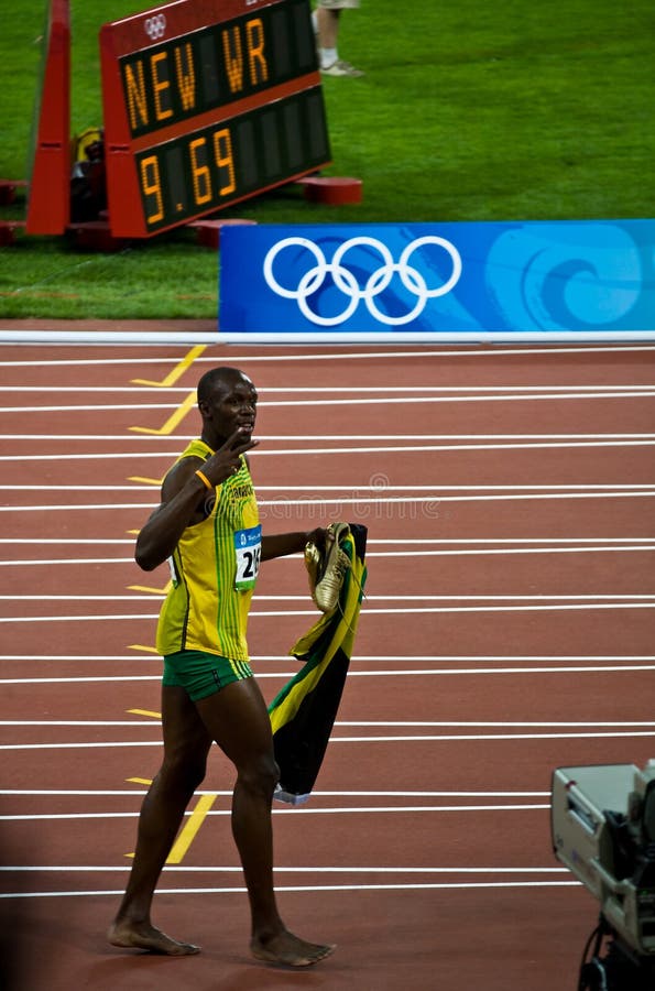 Il bullone di Usain celebra il nuovo record del mondo immagini stock Il bullone di Usain celebra il nuovo record del mondo immagini stock