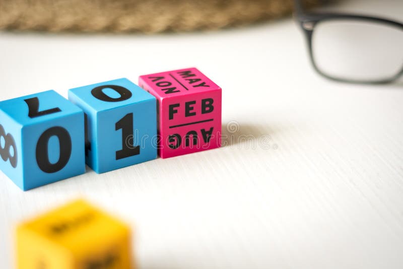 Modern perpetual calendar composed of colored cubes and set at the date of February 1st. Modern perpetual calendar composed of colored cubes and set at the date of February 1st