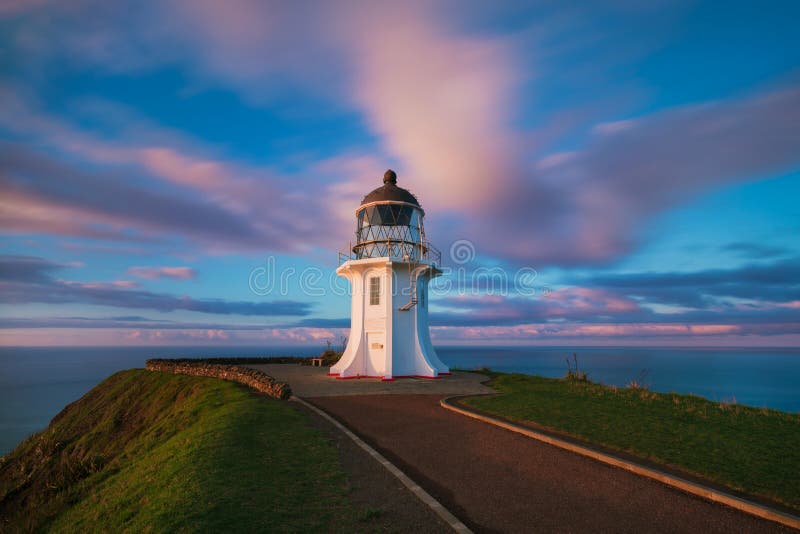 Il capo Reinga, il bordo del nord della Nuova Zelanda, incontra qui indiano e gli oceani Pacifici si incontra qui Bella vista sul fotografie stock Il capo Reinga, il bordo del nord della Nuova Zelanda, incontra qui indiano e gli oceani Pacifici si incontra qui Bella vista sul fotografie stock