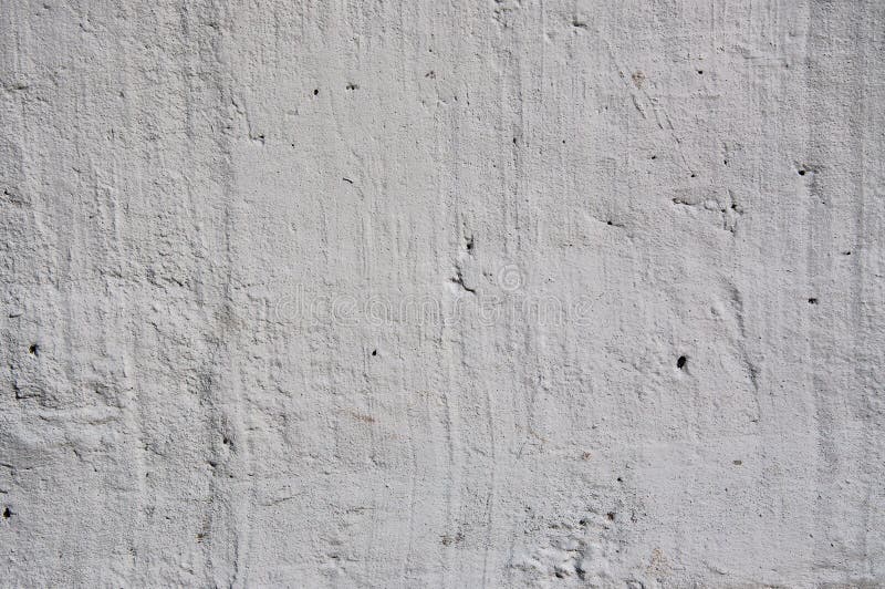 Il colore grigio del fondo ha strutturato il muro di cemento, luce del giorno naturale fotografie stock Il colore grigio del fondo ha strutturato il muro di cemento, luce del giorno naturale fotografie stock