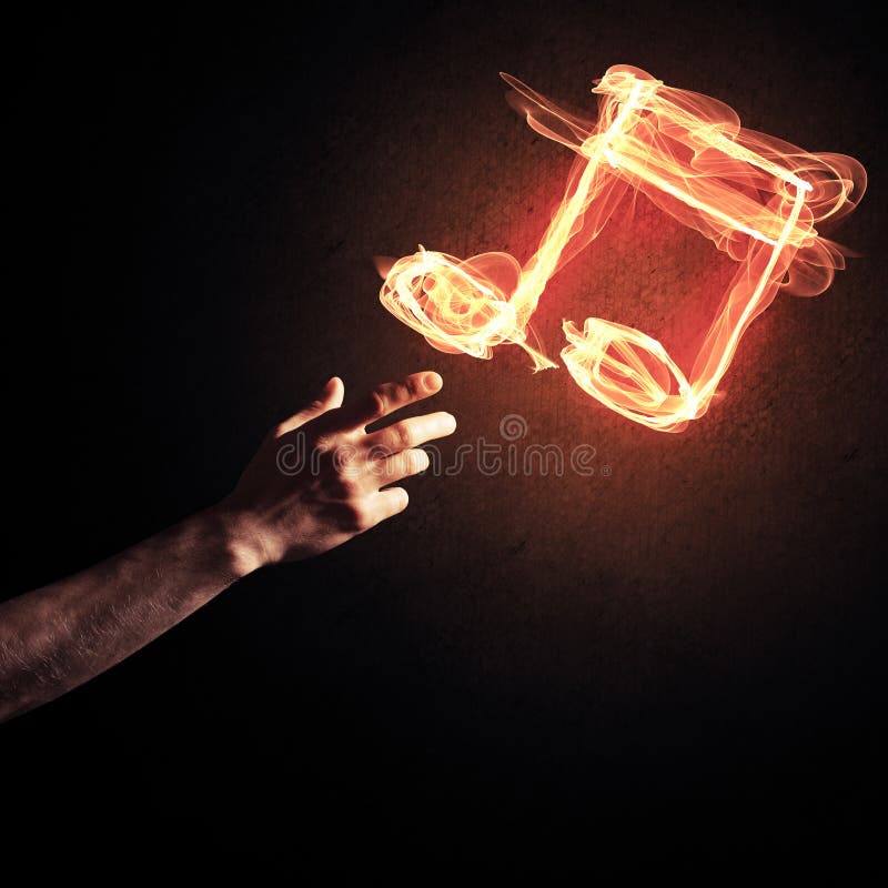 Il concetto di musica ha presentato dall'icona bruciante del fuoco e dal gestur della creazione fotografie stock libere da diritti Il concetto di musica ha presentato dall'icona bruciante del fuoco e dal gestur della creazione fotografie stock libere da diritti