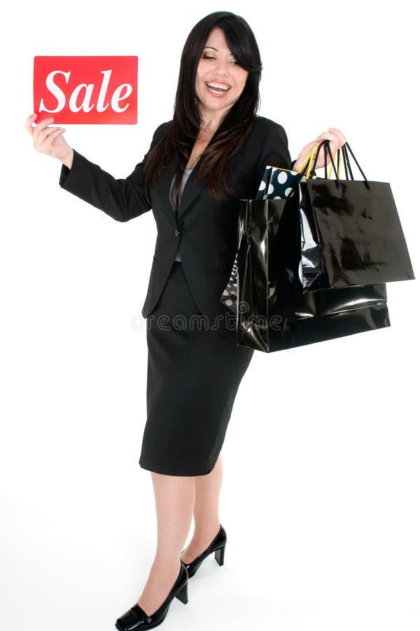 Il est temps de vente - femme avec des sacs à provisions image libre de droits Il est temps de vente - femme avec des sacs à provisions image libre de droits