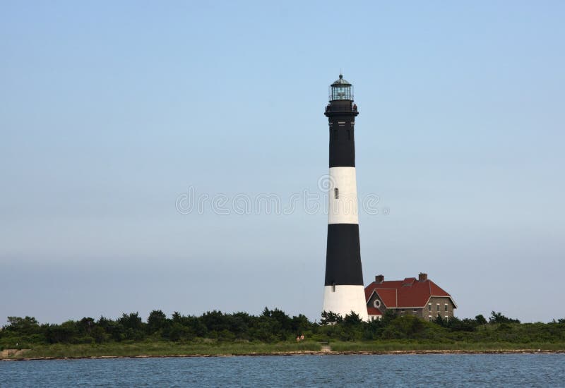 Il faro dell'isola del fuoco immagini stock libere da diritti Il faro dell'isola del fuoco immagini stock libere da diritti