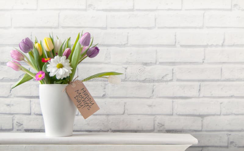 Il giorno di madri felice fiorisce il fondo fotografia stock