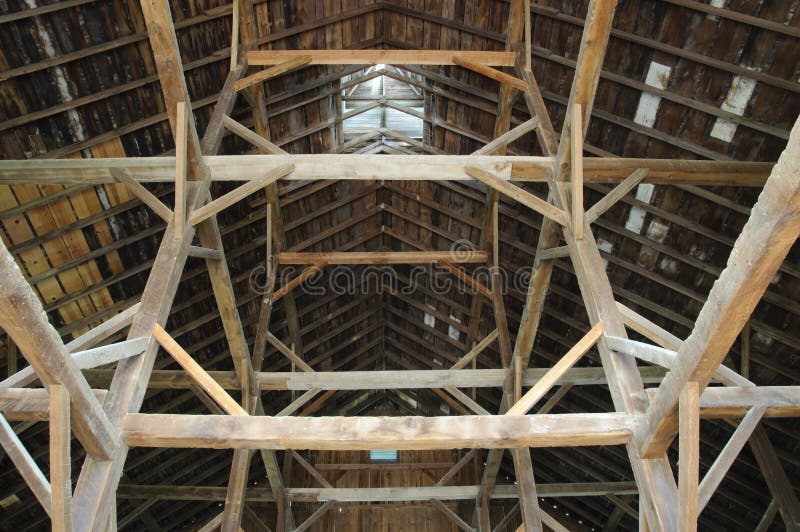 Side view of beams in an old barn. Side view of beams in an old barn