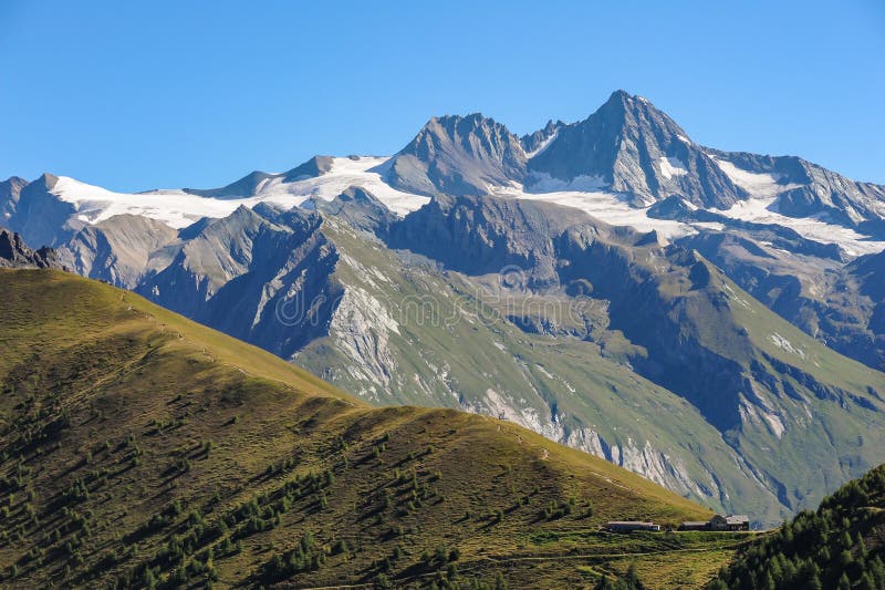 The GroÃŸglockner in the center of the austrian national park Hohe Tauern high Tauern. The GroÃŸglockner in the center of the austrian national park Hohe Tauern high Tauern