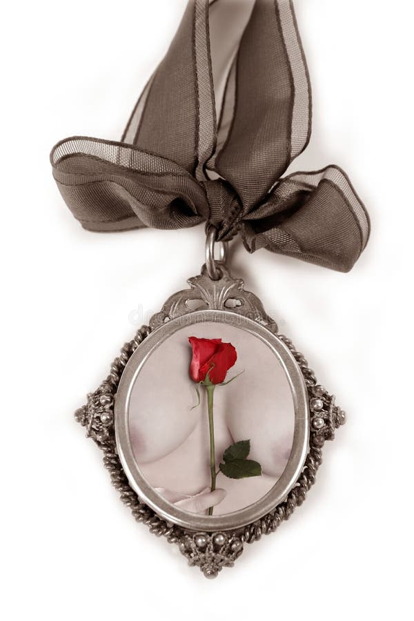 Cameo silver locket with valentines red rose on nude woman hands. Cameo silver locket with valentines red rose on nude woman hands