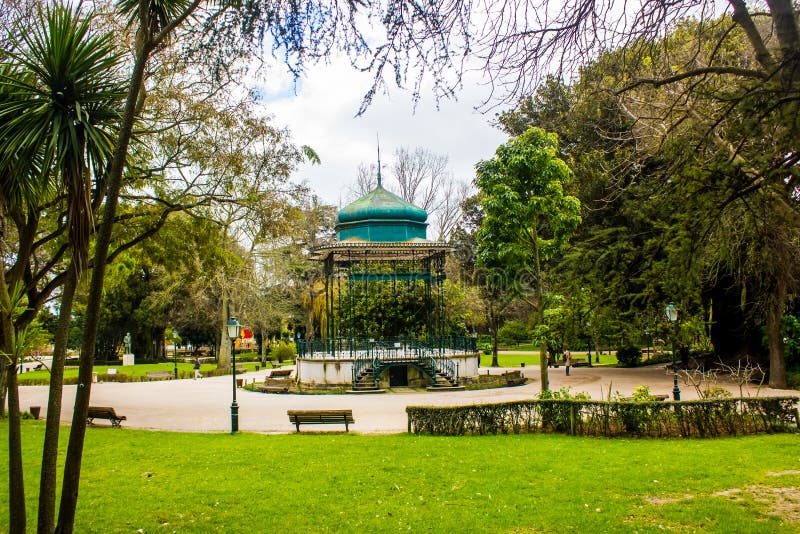 The famous bandstand of the Jardim da Estrela, in green wrought iron, which was built in 1884. Jardim da Estrela, later renamed Jardim Guerra Junqueiro, was created in the middle of the 19th century, in front of the Estrela Basilica in Lisbon. It was officially opened in 1852 and built in the style of the English gardens, of romantic inspiration. The famous bandstand of the Jardim da Estrela, in green wrought iron, which was built in 1884. Jardim da Estrela, later renamed Jardim Guerra Junqueiro, was created in the middle of the 19th century, in front of the Estrela Basilica in Lisbon. It was officially opened in 1852 and built in the style of the English gardens, of romantic inspiration.
