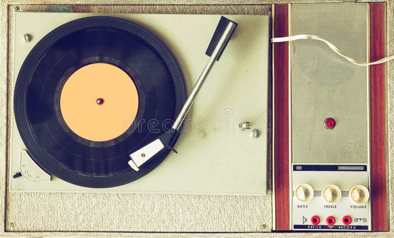 Top view of old record player, image is retro filtered. Top view of old record player, image is retro filtered