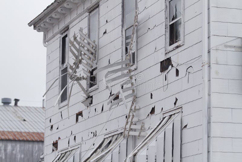 Hotel siding and awnings ruined by hail stones in massive storm in Blair, Nebraska. Hotel siding and awnings ruined by hail stones in massive storm in Blair, Nebraska